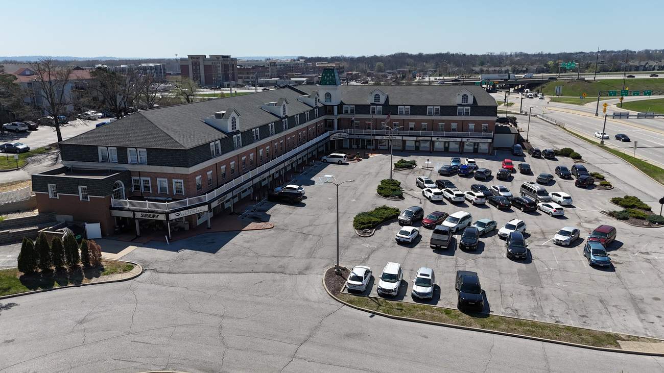 Aerial view of Three Flags Center against the St. Charles skyline